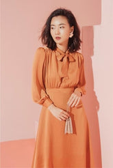 Silk Midi Dress with Tie-Neck Detail and Long Sleeves